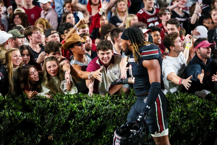 Debo Williams high-fiving Gamecock fans after the win against Kentucky. (18th Nov., 2023)